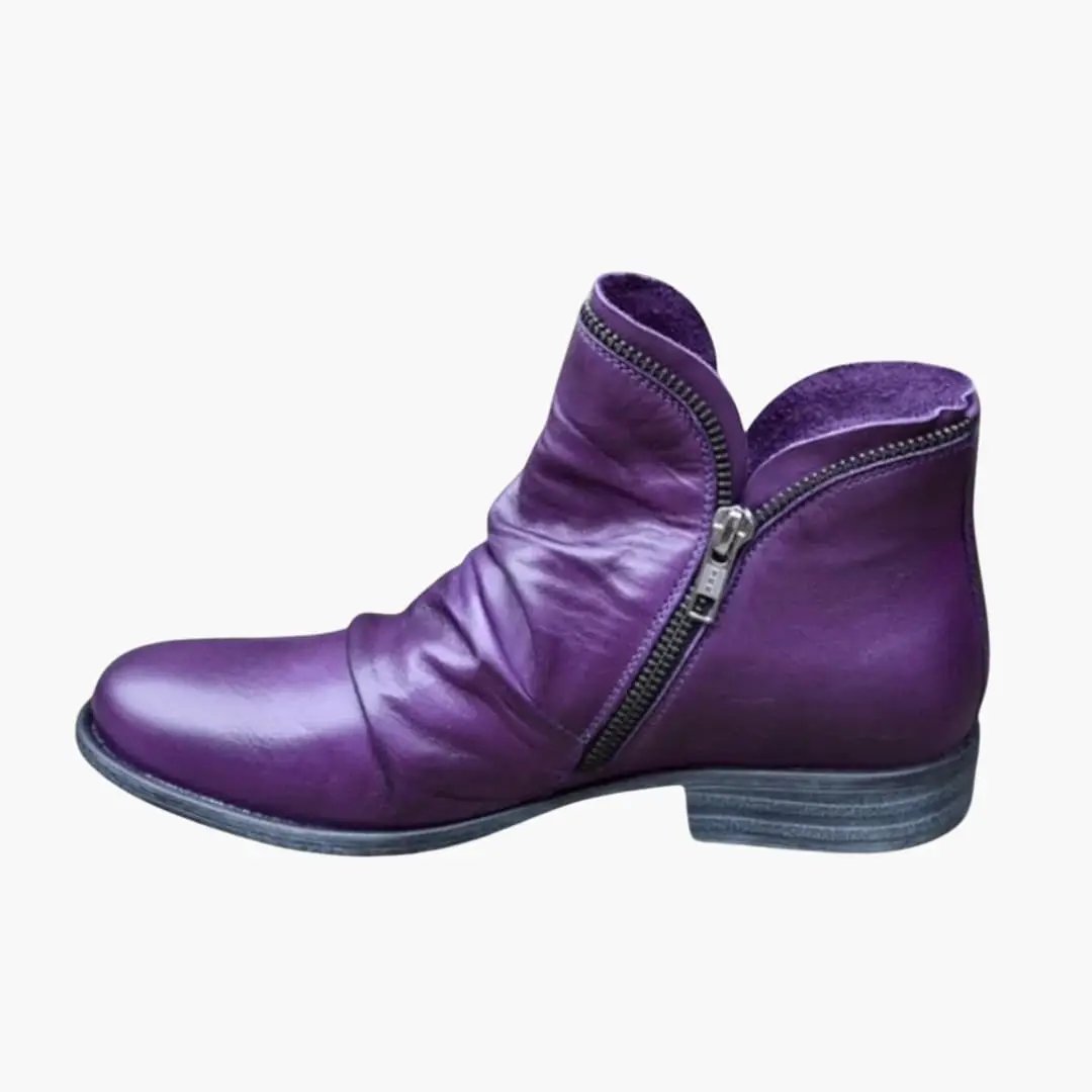 Women's orthopedic boot in purple leather with side zipper, cushioned interior, textured sole