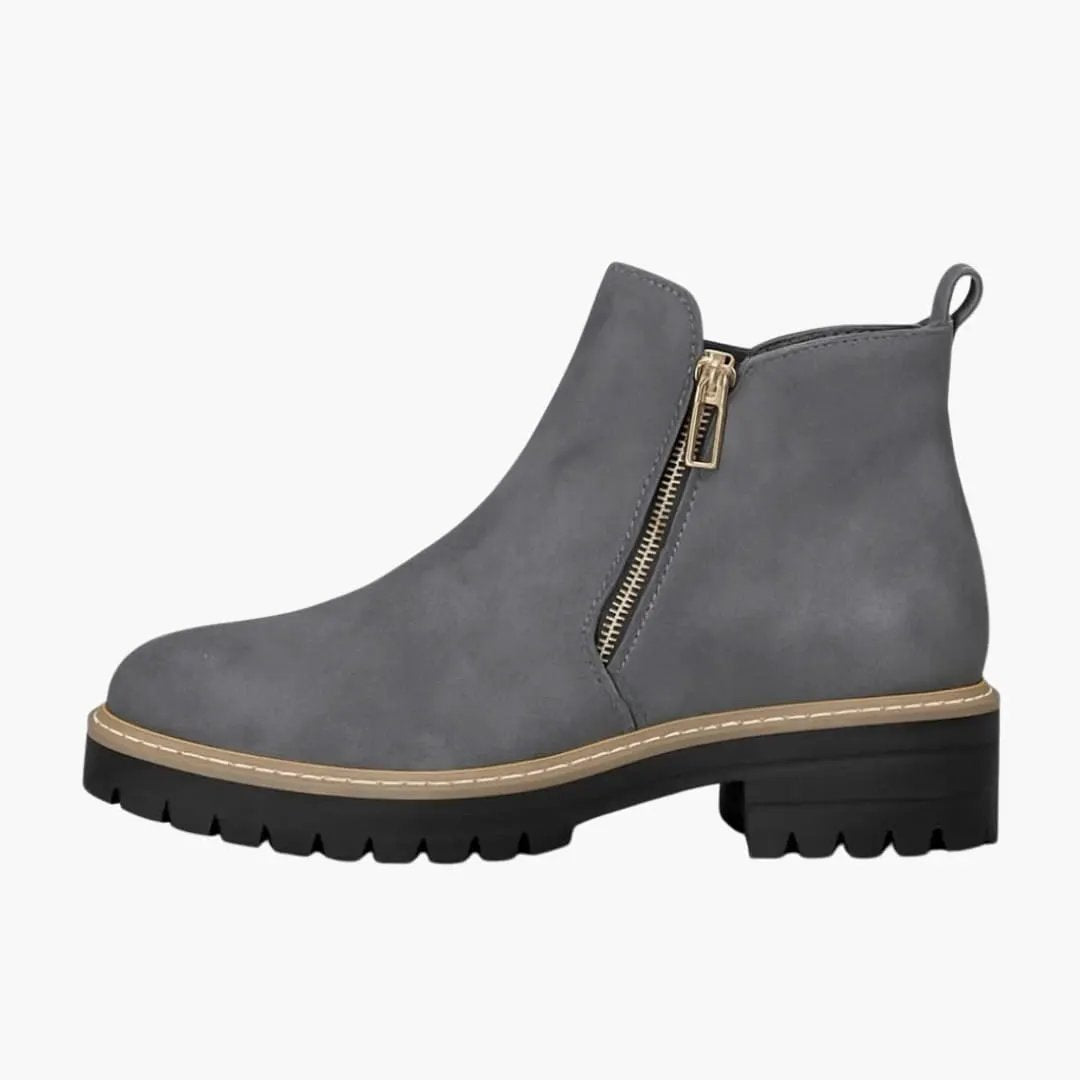 Women's orthopedic ankle boot with side zip and cushioned insole, gray upper, chunky lug sole