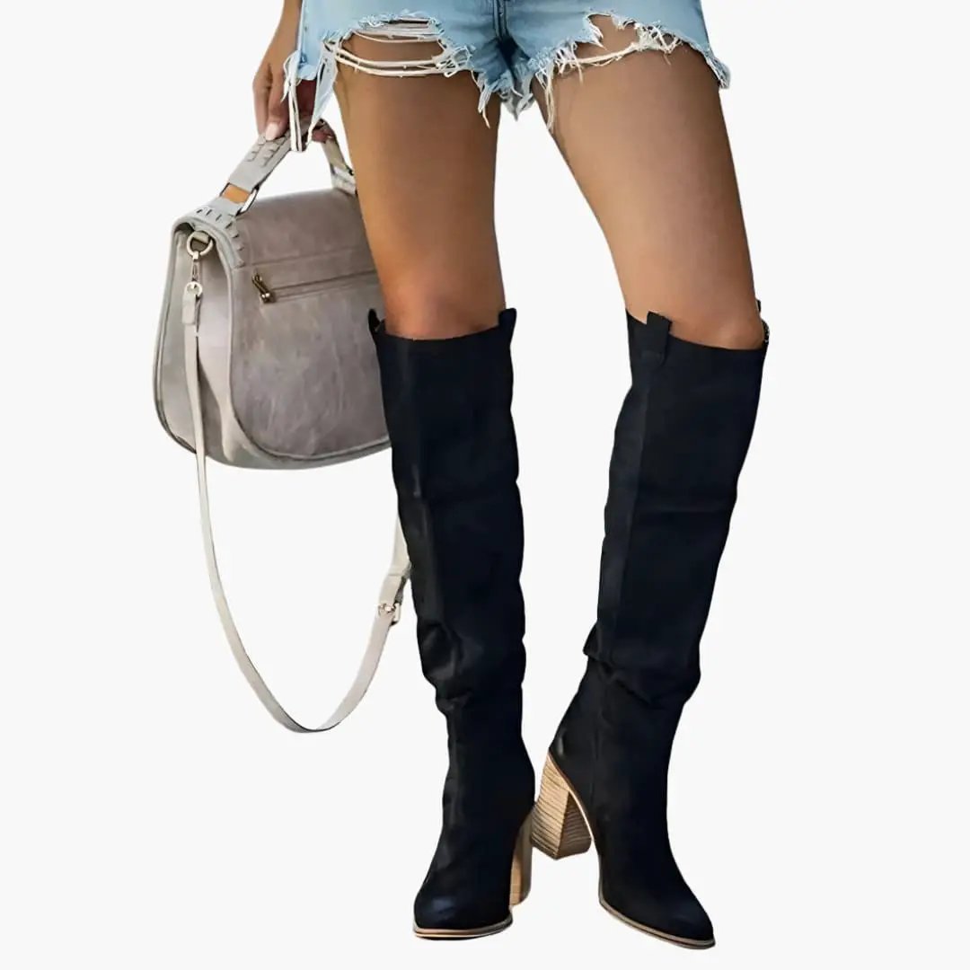 Women's orthopedic knee-high boots in black with a tan stacked-wood heel.