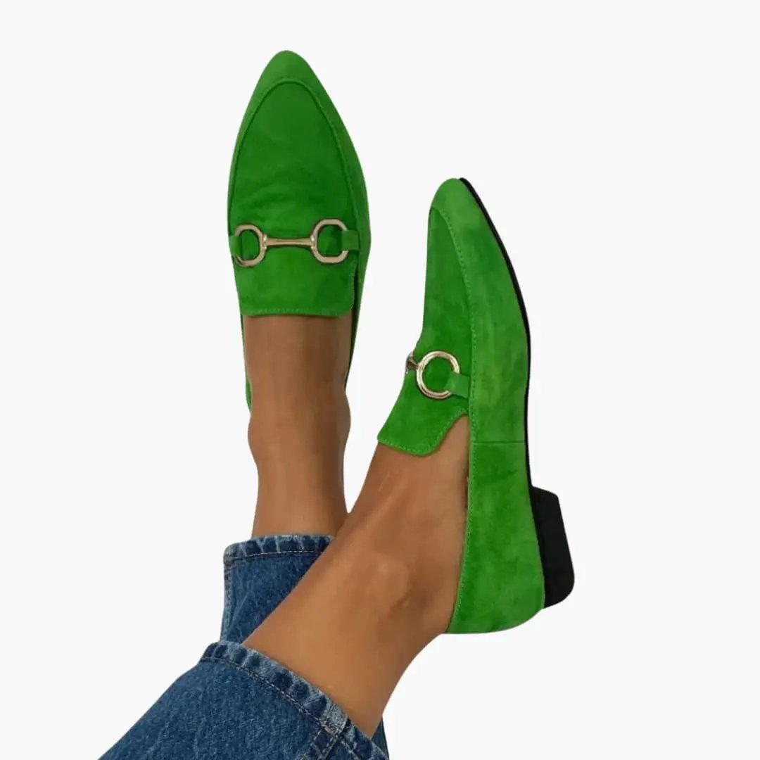 Women's green suede orthopedic loafers with gold horsebit detail, flat sole.