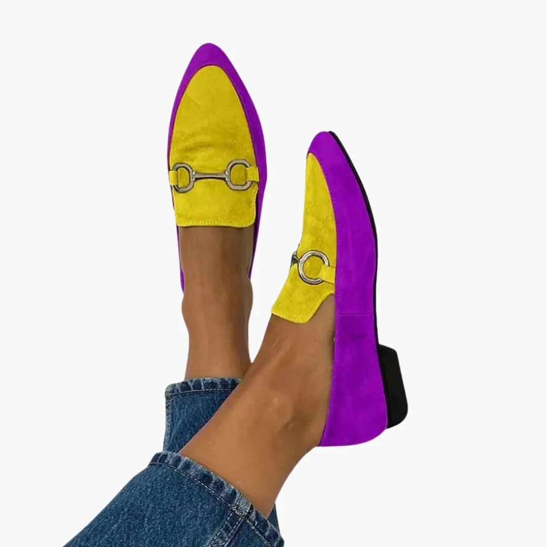 Pair of women's orthopedic loafers in yellow and purple suede with a flexible sole and horsebit detail
