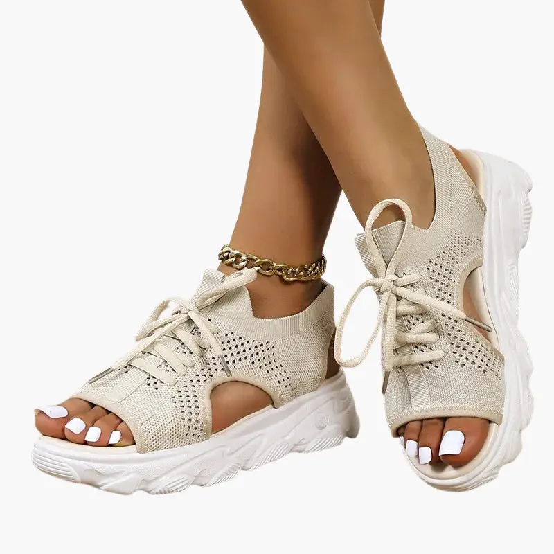 Women’s orthopedic sandals by Wilfred Smith in beige knit with cushioned footbed and adjustable laces.