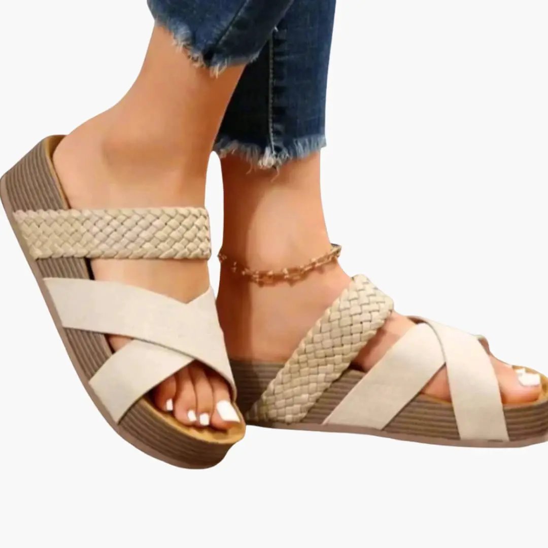 Women's orthopedic sandals with cushioned insole and flexible sole, beige braided straps; pair shown