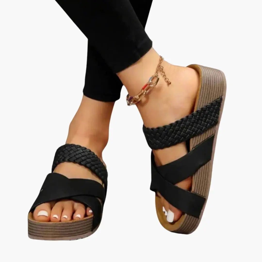 Women's orthopedic sandals with cushioned insole and flexible sole, black braided straps on tan platform sole