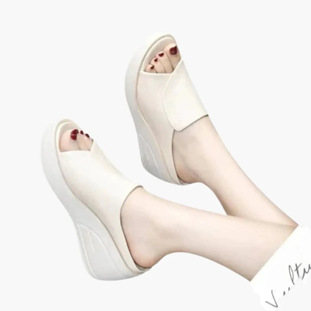 Women's orthopedic sandals by Wilfred Smith with wedge sole and slip-on design in white