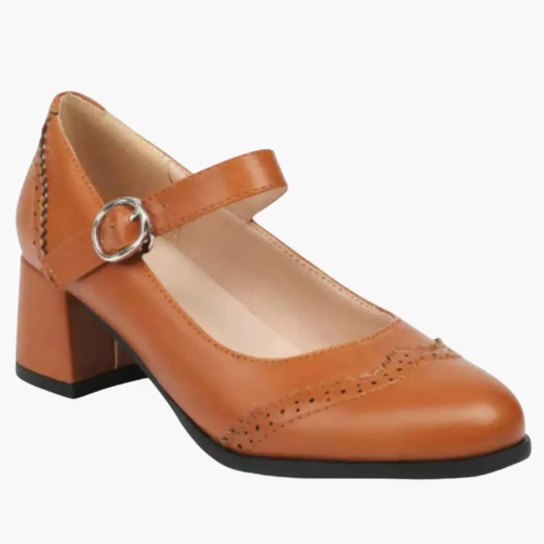 Orthopedic women's flats in tan leather with Mary Jane strap and buckle, low block heel.