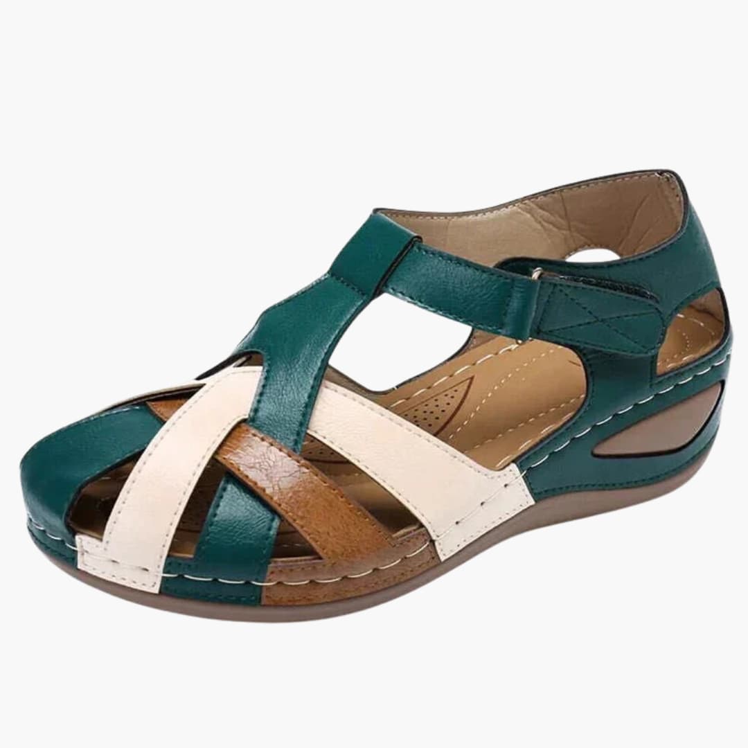 Women's orthopedic sandals with buckle straps and wedge sole in teal, white, and brown leather by Wilfred Smith