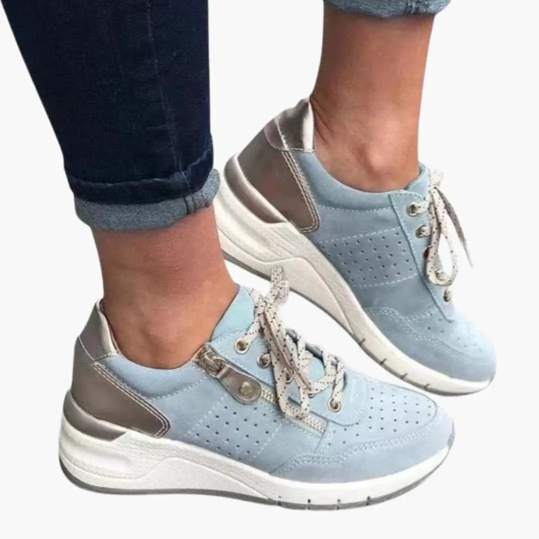 Women's orthopedic sneakers with cushioned sole and lace closure, light blue upper