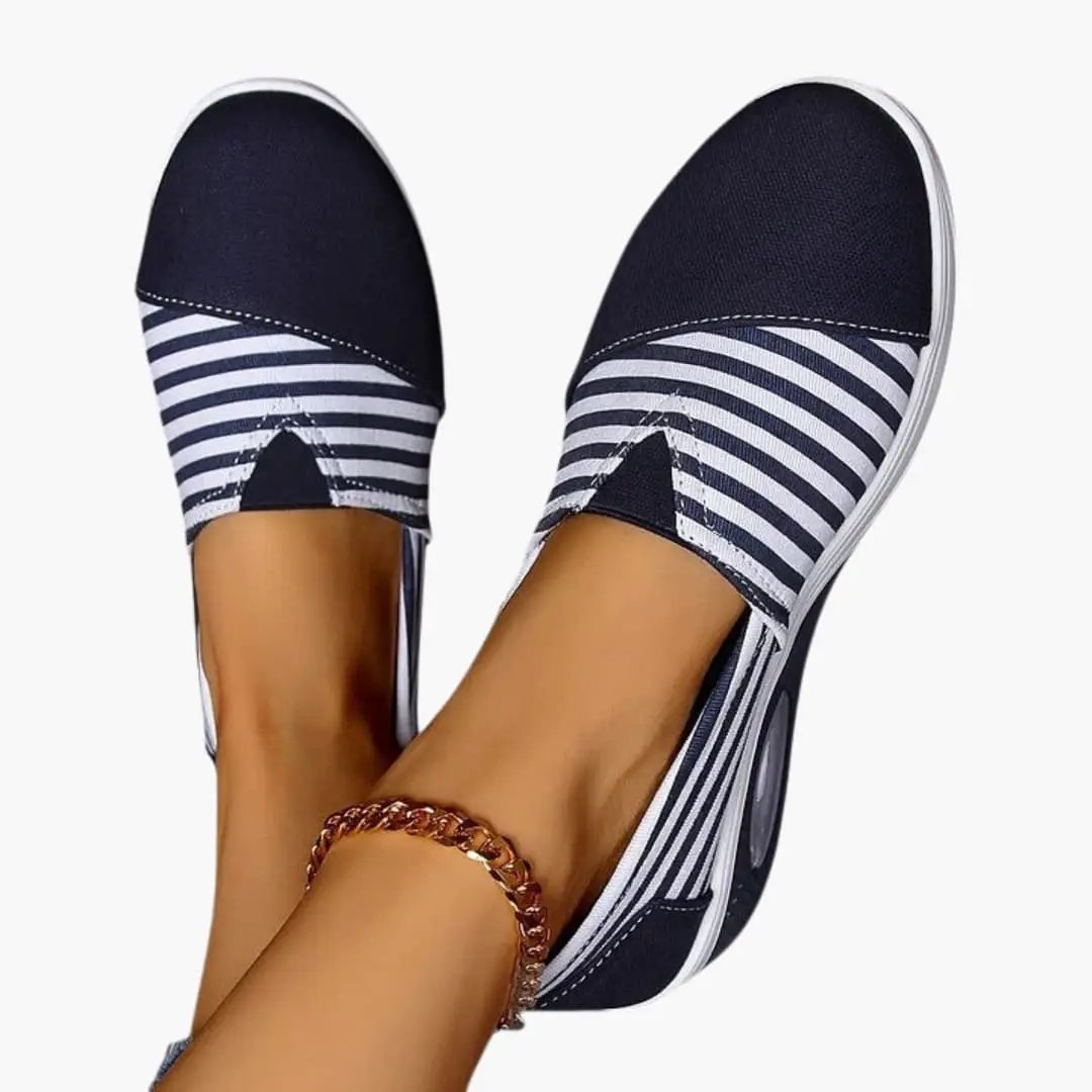 Women's orthopedic slip-on sneakers with navy striped upper and textured sole (pair)