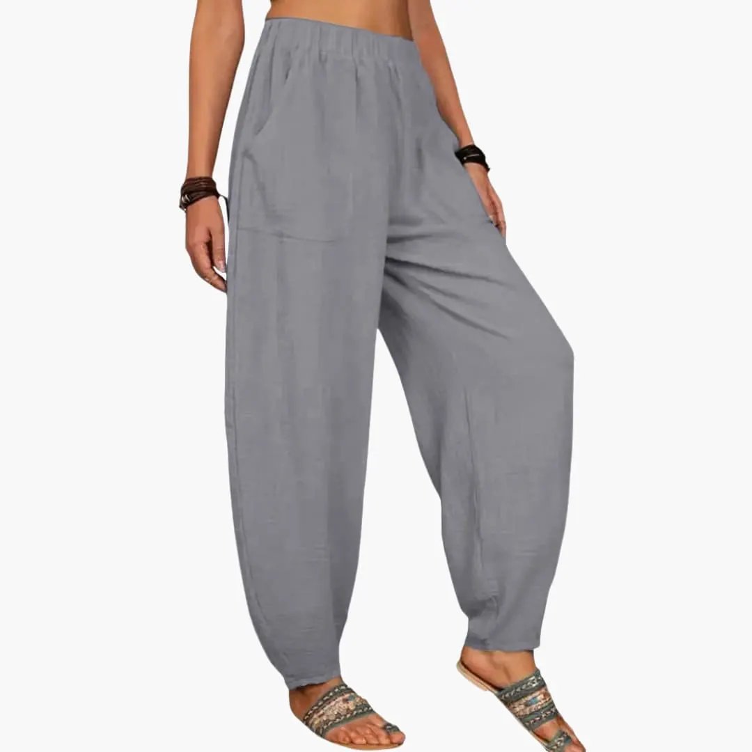 Women's Palazzo Pants with elastic waist and side pockets in gray, wide-leg style.
