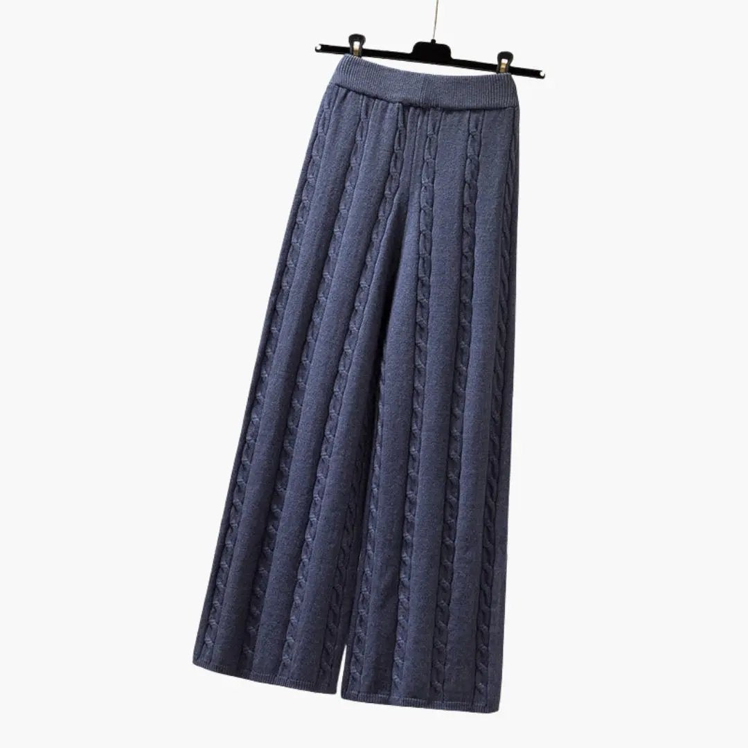 Women's Palazzo Pants by Wilfred Smith, blue knitted trousers with elastic waistband and cable-knit pattern.