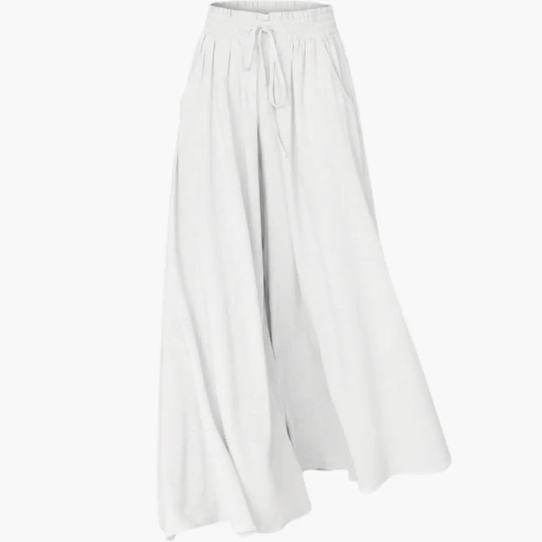 Women's Palazzo trousers by Wilfred Smith with elastic waist and pockets in white.