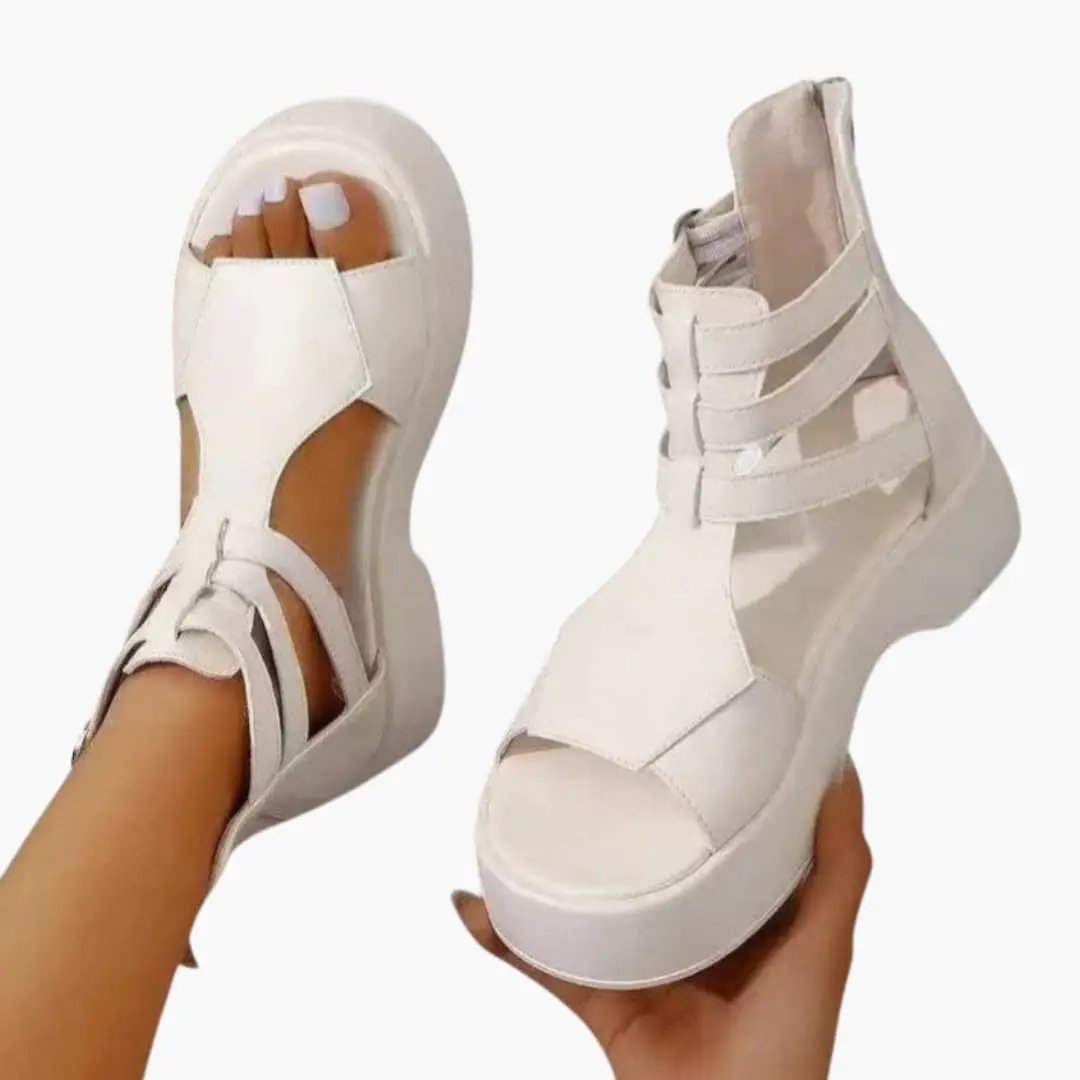 Wilfred Smith women's platform sandals with multi-strap design and ankle closure in white.