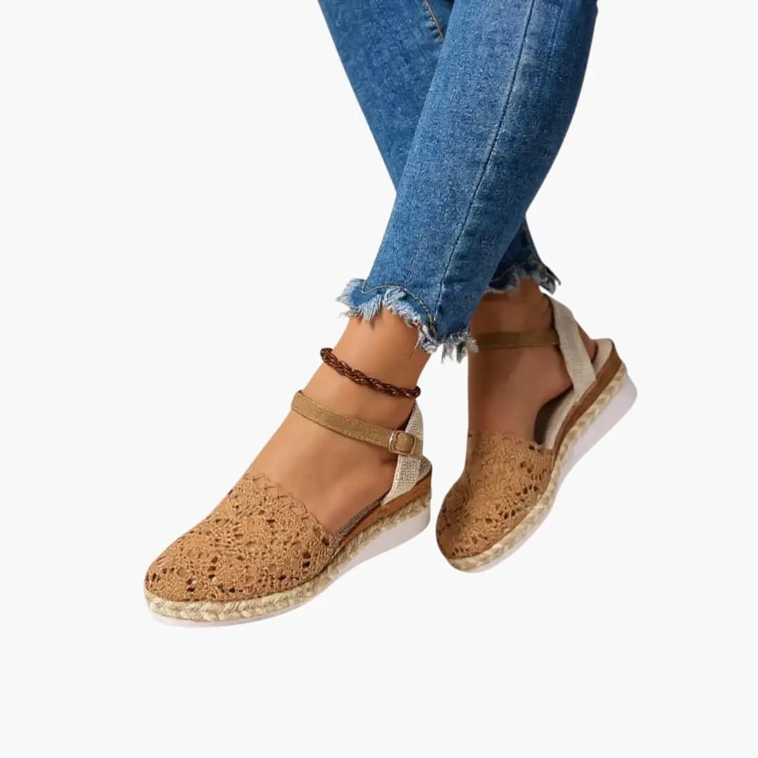 Women's platform sandals with woven tan straps, ankle buckle, and cushioned espadrille-style sole