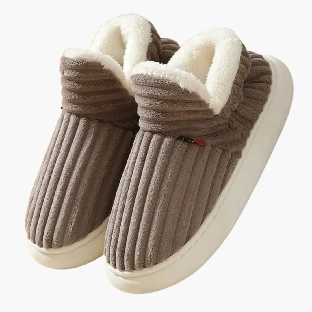 Women’s Plush Slippers with brown ribbed exterior and white faux-fur lining, pair of cozy slip-ons