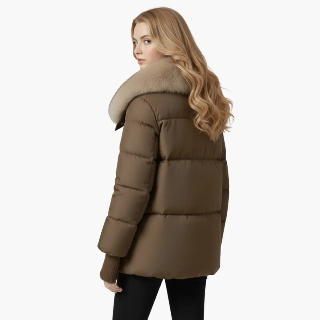 Women's brown puffer jacket with a large cream faux-fur collar and ribbed cuffs, hip-length quilted jacket.