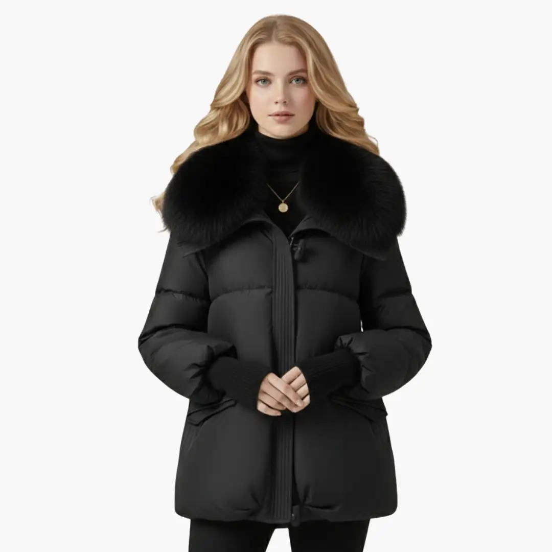 Women's puffer jacket by Wilfred Smith in black with a large faux fur collar and ribbed cuffs
