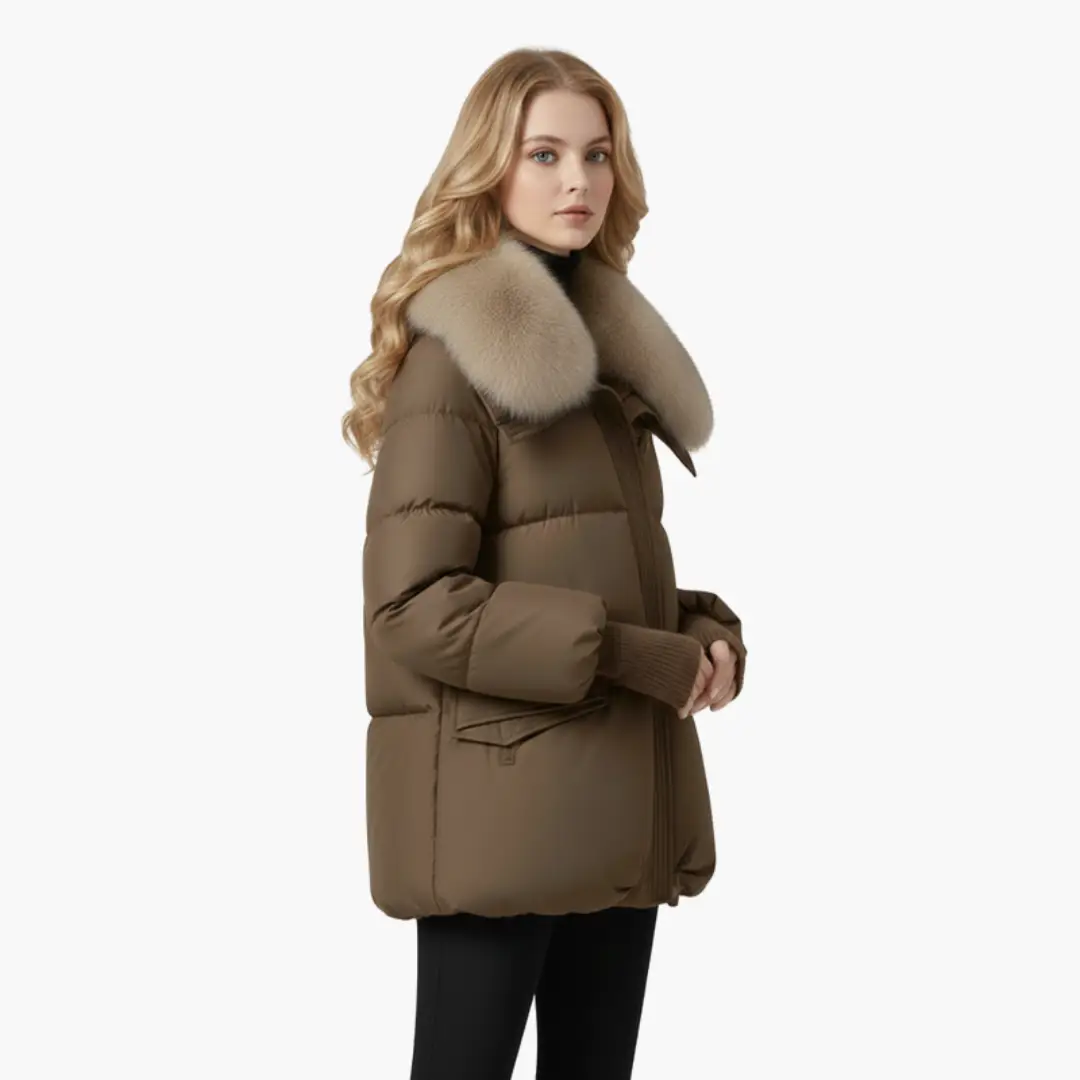 Women’s Puffer Jacket in brown by Wilfred Smith with a light beige faux fur collar and ribbed cuffs