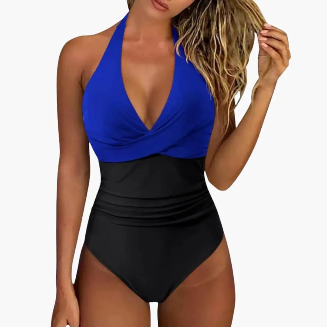 Women's push-up one-piece swimsuit with blue halter top and black ruched waist bottom.