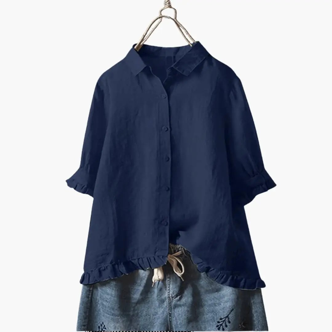 Women's navy blue relaxed-fit woven blouse with long sleeves, button-front and ruffled hem.