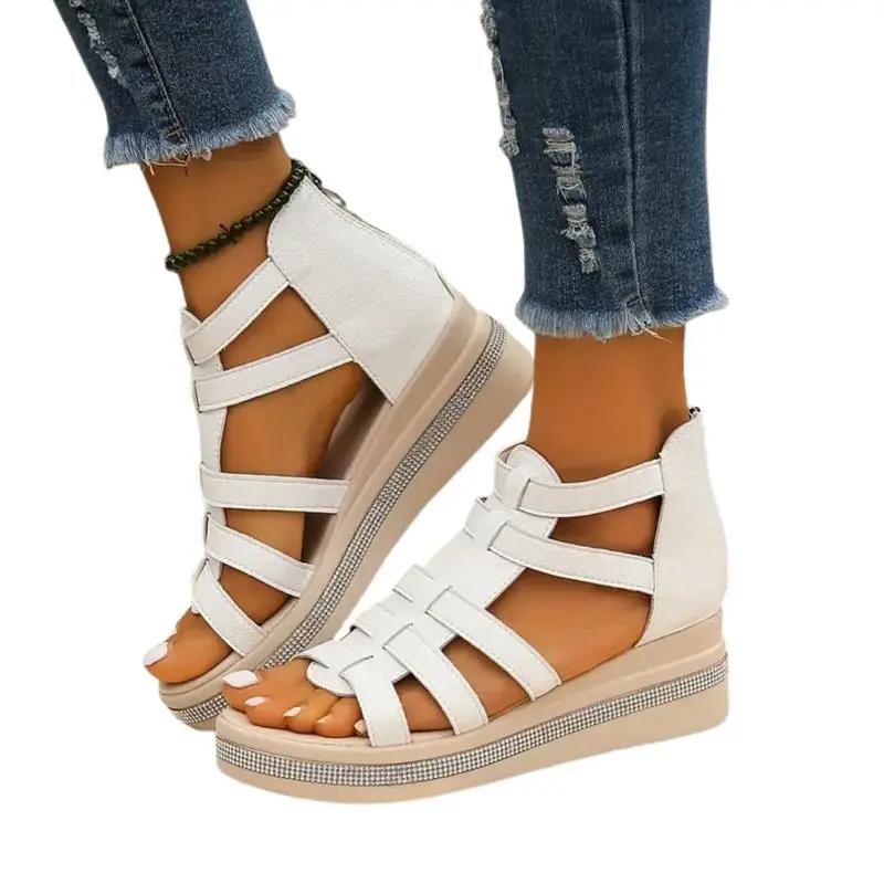 Women's white wedge sandals with adjustable straps and rhinestone decoration