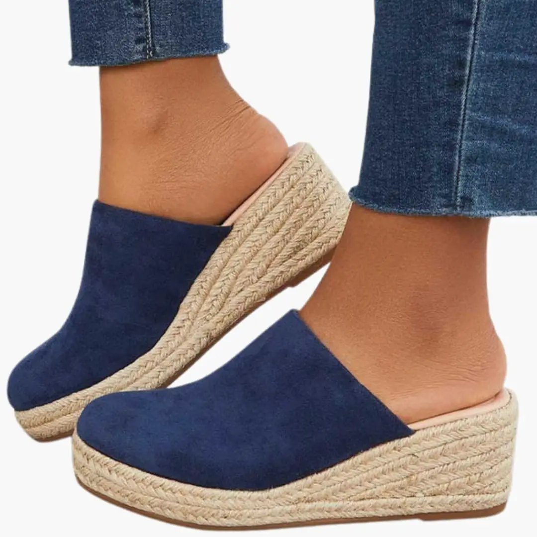 Women's navy blue suede espadrille wedge sandals with cushioned footbed and rope-stitched platform