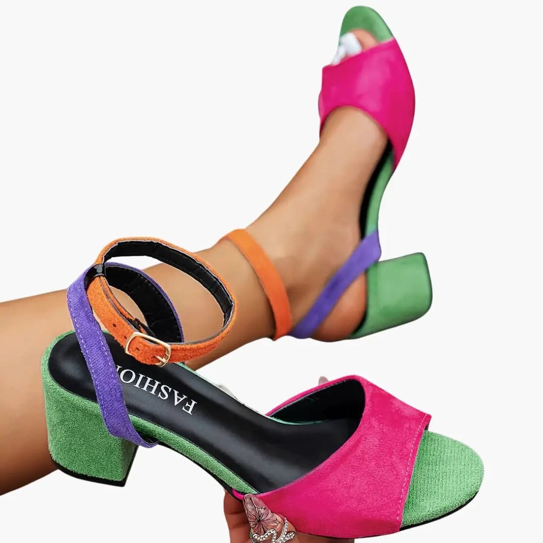 Pair of women's slingback sandals with cushioned insole; pink, green, purple and orange straps