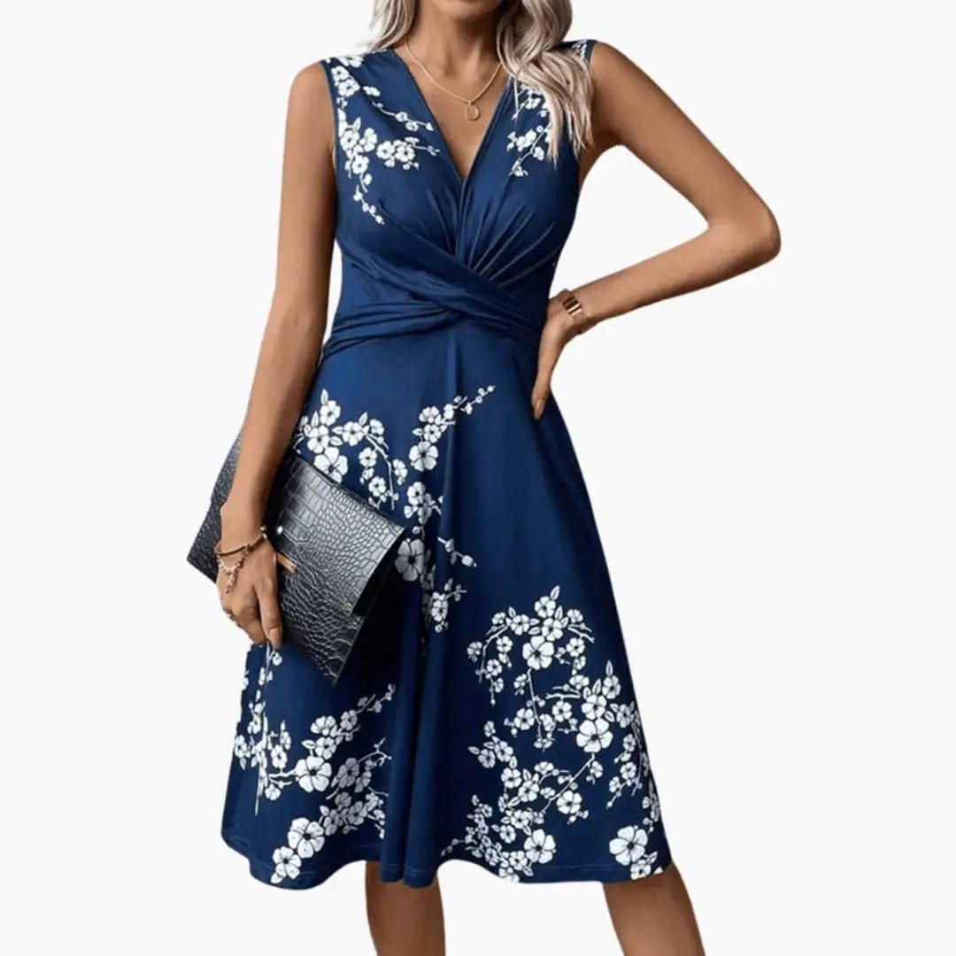 Women’s sleeveless V-neck floral midi dress in navy blue with white blossoms by Wilfred Smith