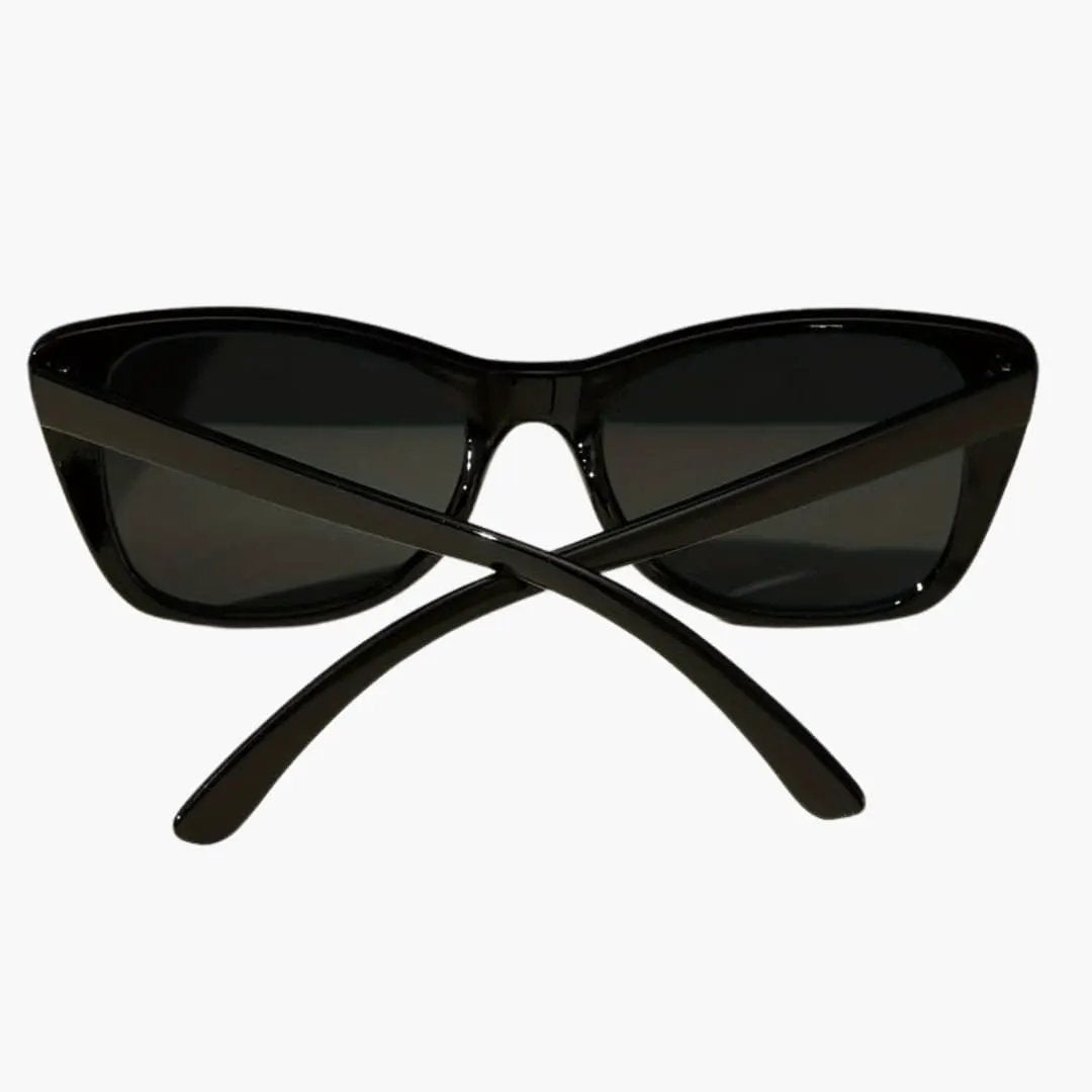 Women's sunglasses with a black cat-eye frame and dark lenses