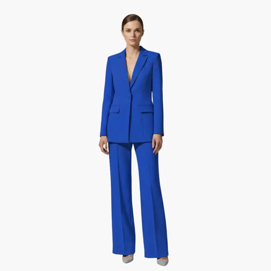 Women's blue blazer and pants two-piece suit by Wilfred Smith