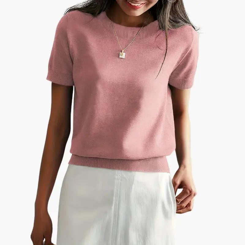 Women's pink short-sleeve knit top by Wilfred Smith, lightweight fabric
