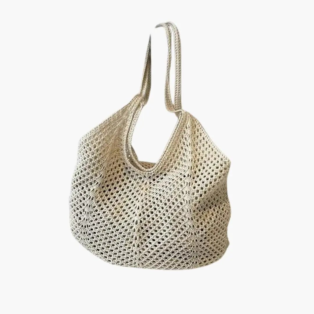 Women's tote bag with woven design in natural beige, open-top with double handles.