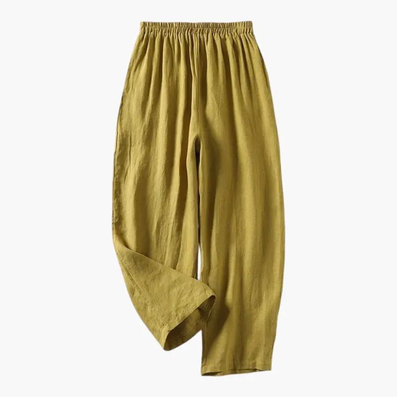Women's trousers with elastic waistband and side pockets in mustard fabric, wide-leg style by Wilfred Smith