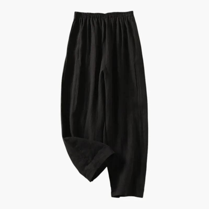 Women's trousers with elastic waistband and side pockets, black wide-leg pull-on pants.