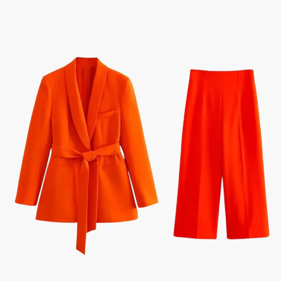 Women’s two-piece blazer and straight-leg pants set in orange; belted blazer with matching pants