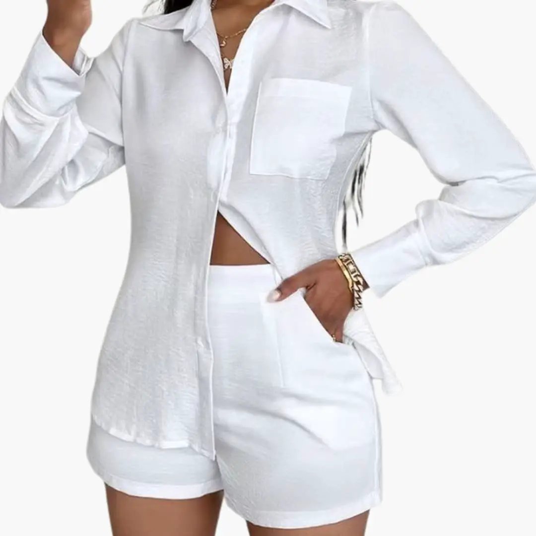 Women’s two-piece outfit with white blazer and shorts by Wilfred Smith