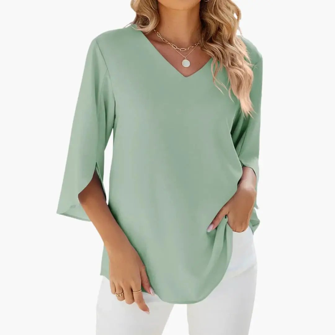 Women’s V-Neck Long Sleeve Blouse in mint green with relaxed fit and curved hem