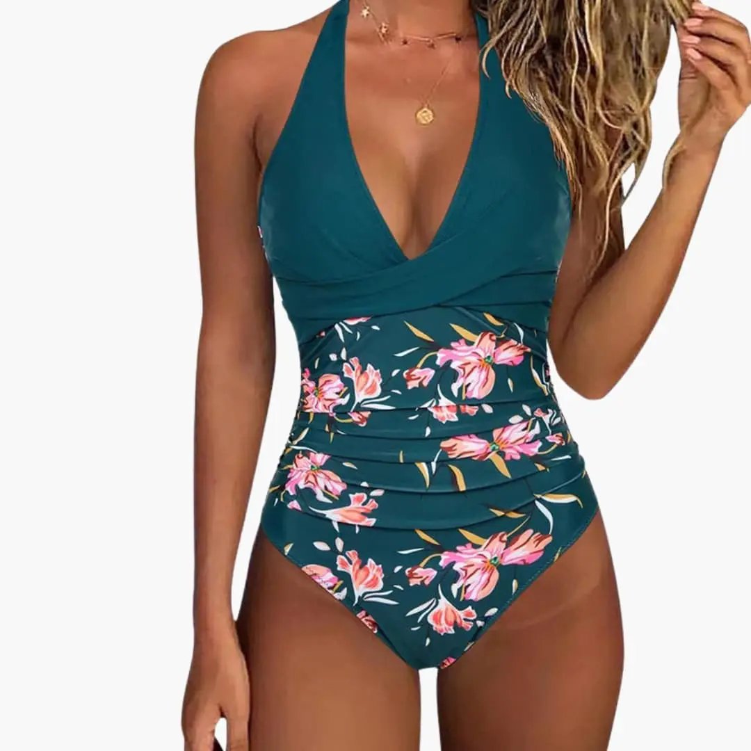 Women’s V-Neck One-Piece Swimsuit by Wilfred Smith; teal solid top with pink floral-printed ruched midsection.