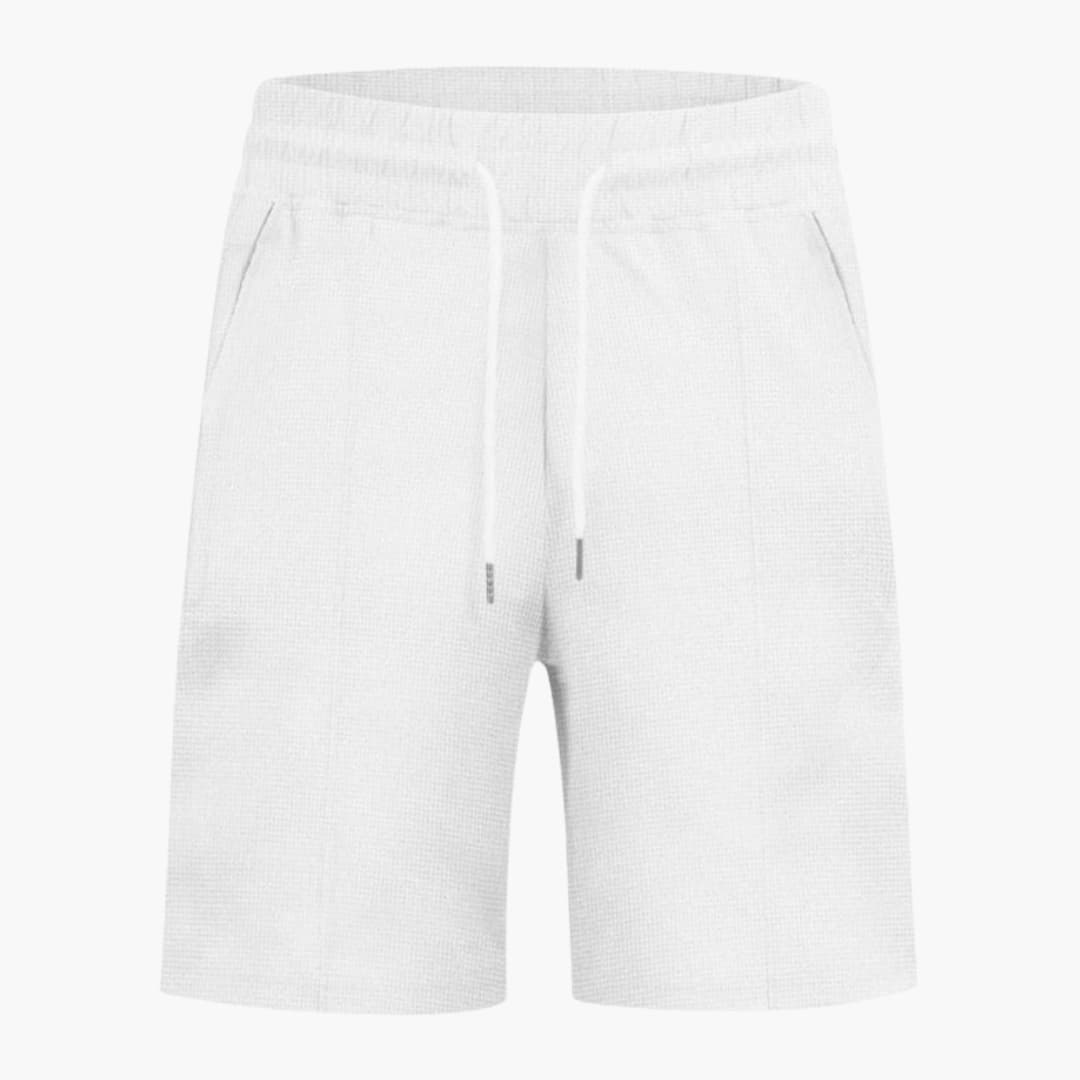 Women's waffle shorts with elastic drawstring waist and straight legs in white, Wilfred Smith.