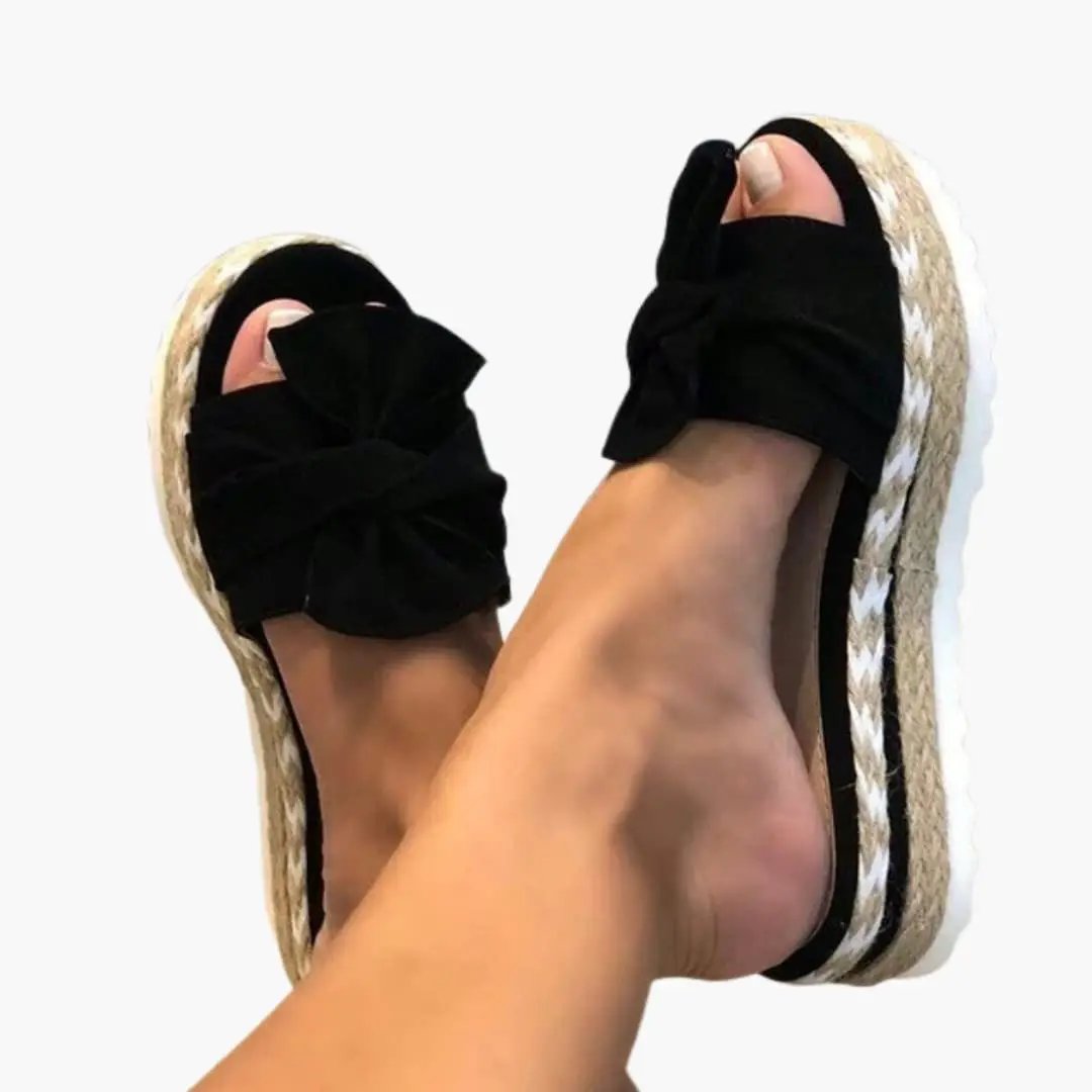 Women's wedge sandals with black bow detail and jute espadrille wedge sole