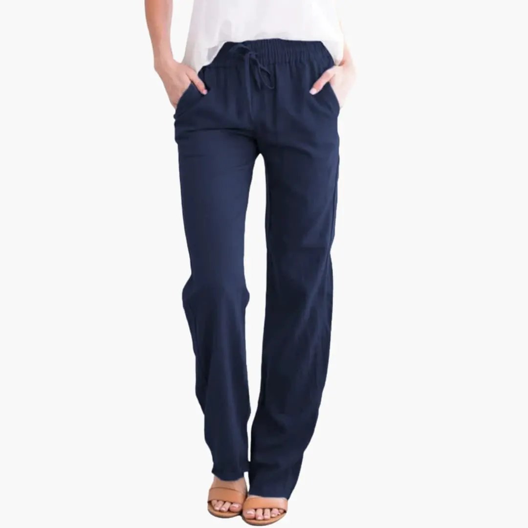Women’s wide-leg navy pants with elastic drawstring waist and pockets by Wilfred Smith