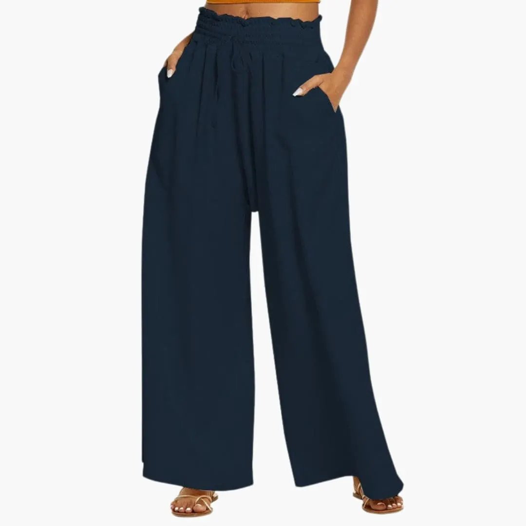 Women's wide-leg pants in navy with a ruffle waist and side pockets