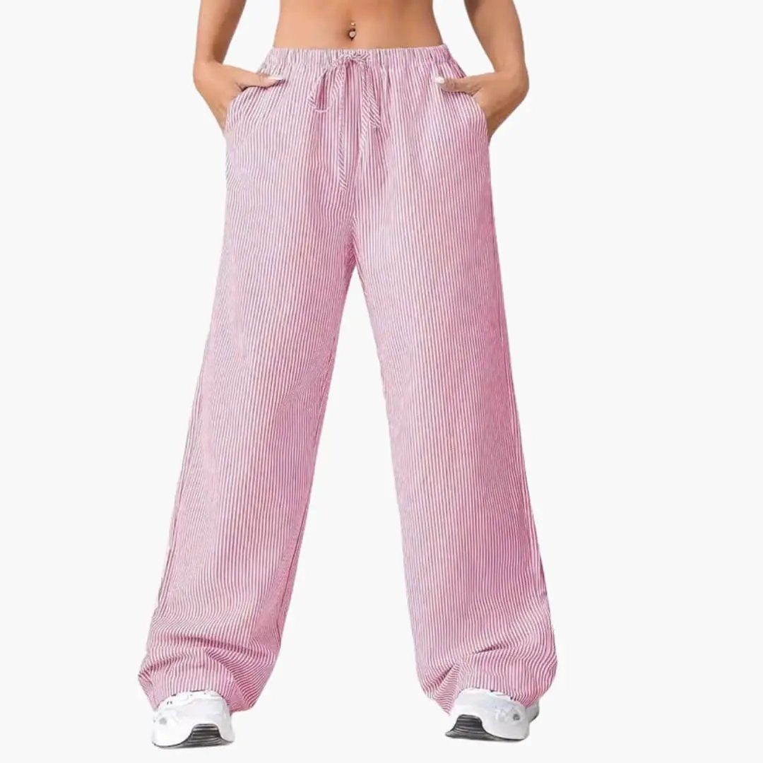 Women’s wide-leg pants by Wilfred Smith, pink striped with side pockets.