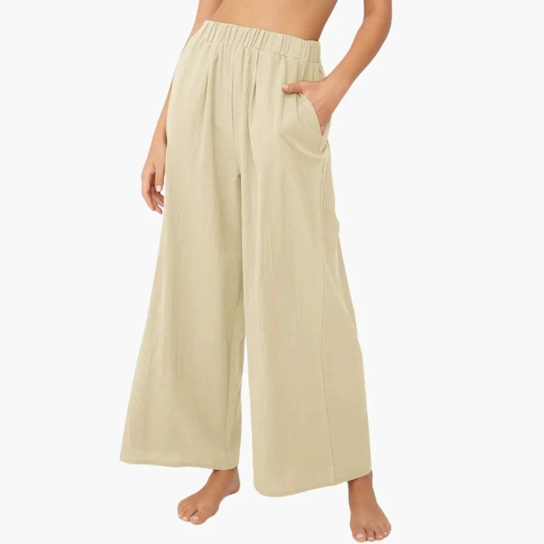 Women's wide-palazzo pants by Wilfred Smith in beige with elastic waistband, side pockets, flowing silhouette