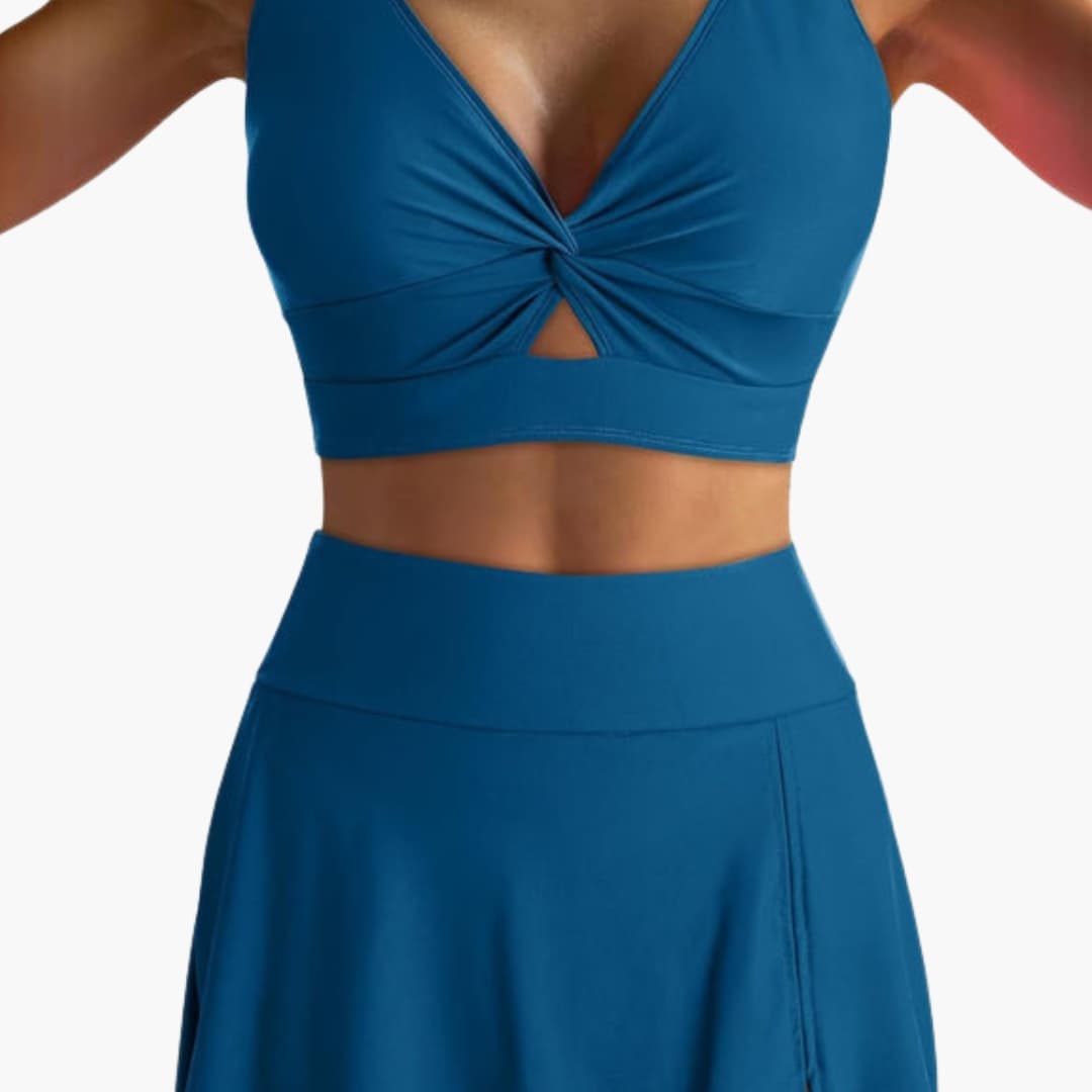 Women’s wrap bikini set with twist V-neck top and high-waisted skirted bottoms in blue
