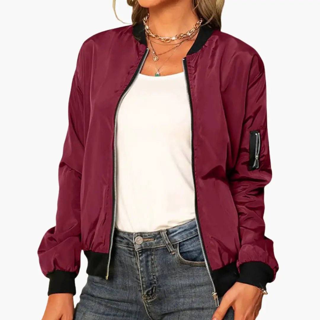 Women’s burgundy zip-up bomber jacket with ribbed black trim