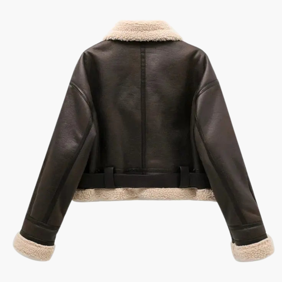 Women's zip bomber jacket by Wilfred Smith with belted hem and shearling collar and cuffs, black leather