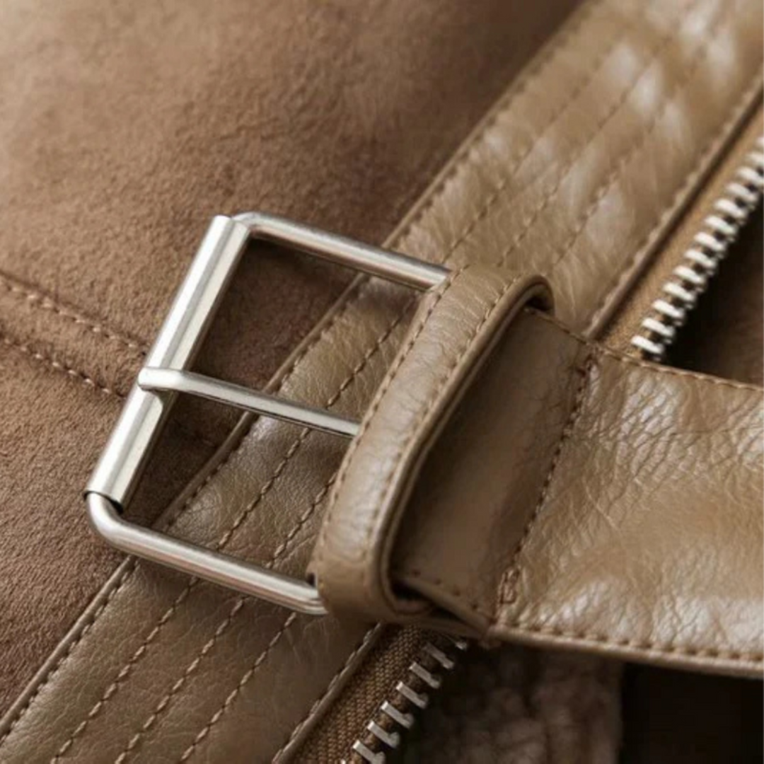 Women’s Zip Jacket by Wilfred Smith in brown leather with adjustable belt hem and metal buckle.